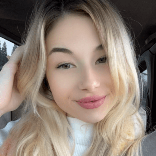 Smiling woman with long blonde hair.